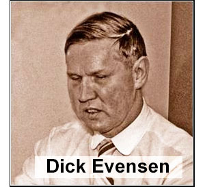Photo shows Dick Evensen wearing a white shirt and tie, we can see him from the chest up.  His eyes are closed and he seems to be concentrating or speaking.