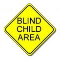 photo shows sign saying 'BLIND CHILD AREA'