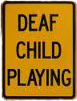 photo shows sign saying 'DEAF CHILD PLAYING'